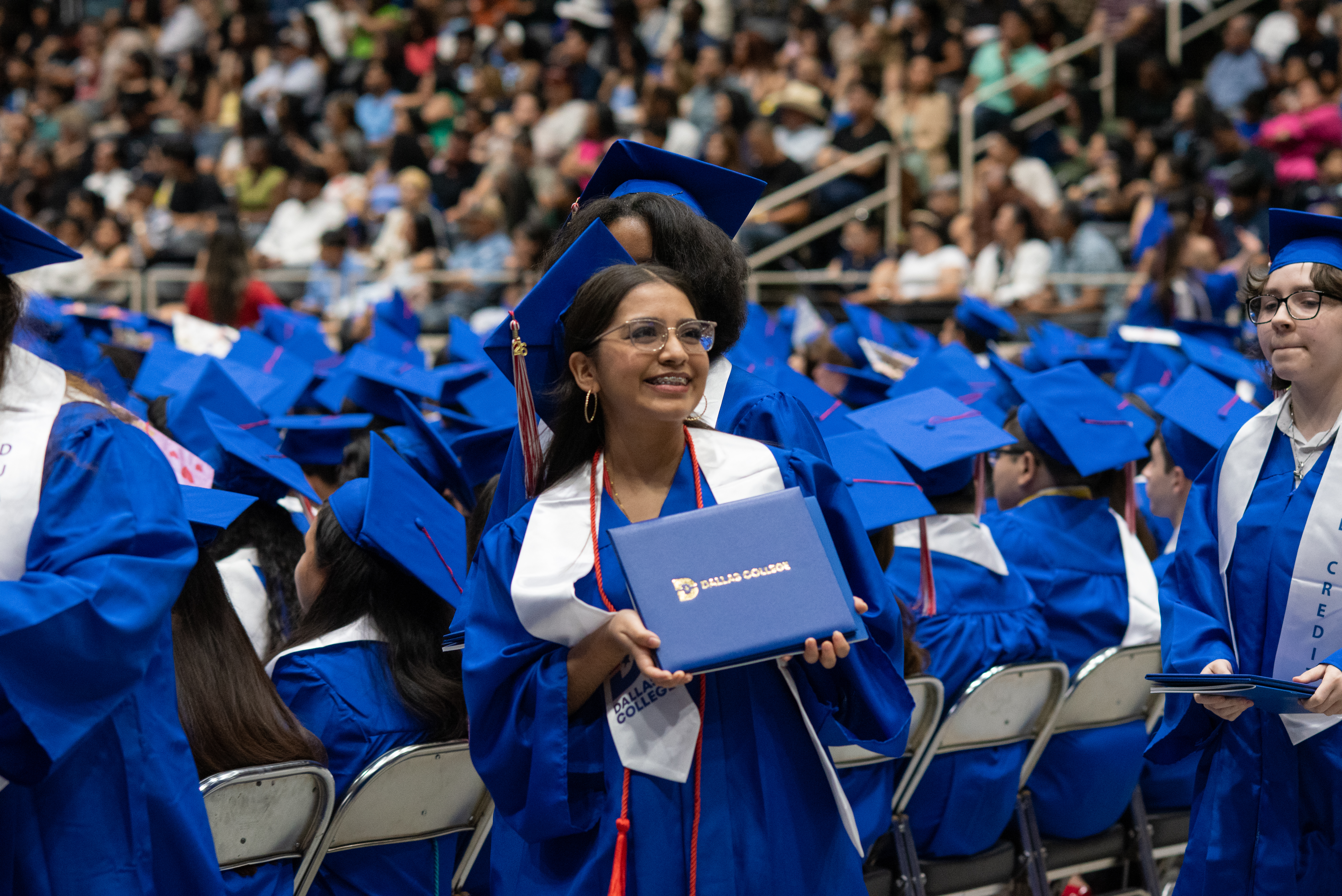Student Showcasing Diploma