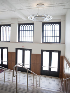 Photo of Dallas College Founders' Foyer main entry stairwell.